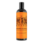Conditioner in a black bottle with a bright orange label and black lettering, featuring a flip-top cap; Business As Usual Conditioner