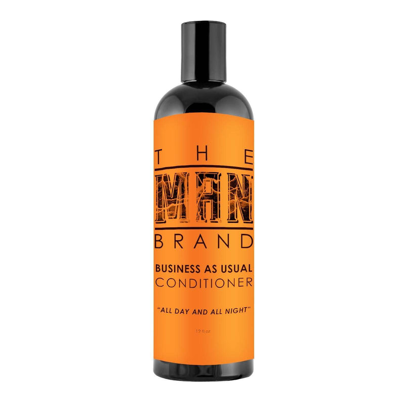 Conditioner in a black bottle with a bright orange label and black lettering, featuring a flip-top cap; Business As Usual Conditioner