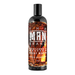 Gentlemen's Bourbon Body Wash in a black plastic bottle with a black cap and amber bourbon-patterned label.