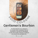 Solid cologne in a vintage slide tin, Gentlemen's Bourbon Solid Cologne has a dark label with warm brown accents.