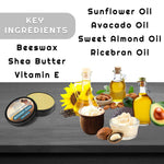 Mystery Man Beard Balm in a black round tin with a beige balm, shown with illustrated natural oil and butter ingredients.