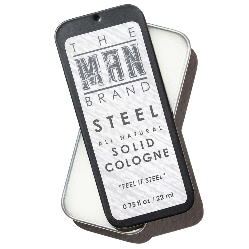 Steel Solid Cologne in a charcoal gray metal slide tin with a brushed silver label and bold black lettering.