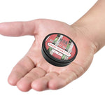 Sweet Tobacco Beard Balm in a small black round tin with a red, green and white patterned label and screw-top lid