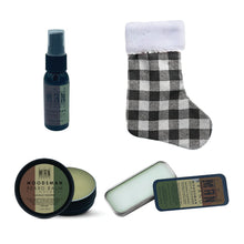Load image into Gallery viewer, The Man Brand&#39;s Stocking Stuffer with solid cologne, beard oil, and beard, balm in red or black plaid stockings
