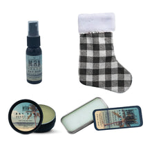 Load image into Gallery viewer, The Man Brand&#39;s Stocking Stuffer with solid cologne, beard oil, and beard, balm in red or black plaid stockings
